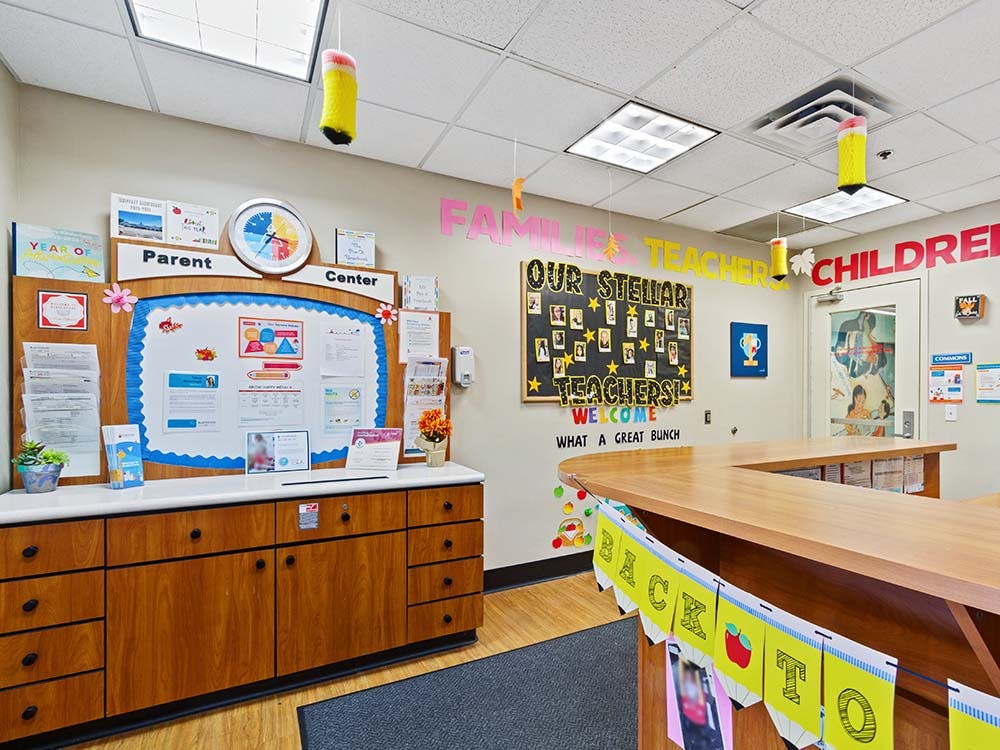 Children's classroom with a bulletin board and a welcome sign for teachers
