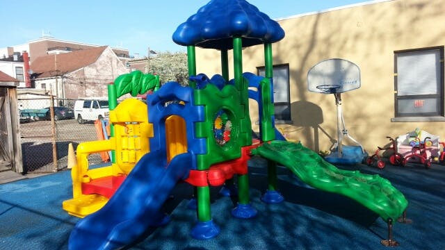 Playground structure with slides and climbing areas