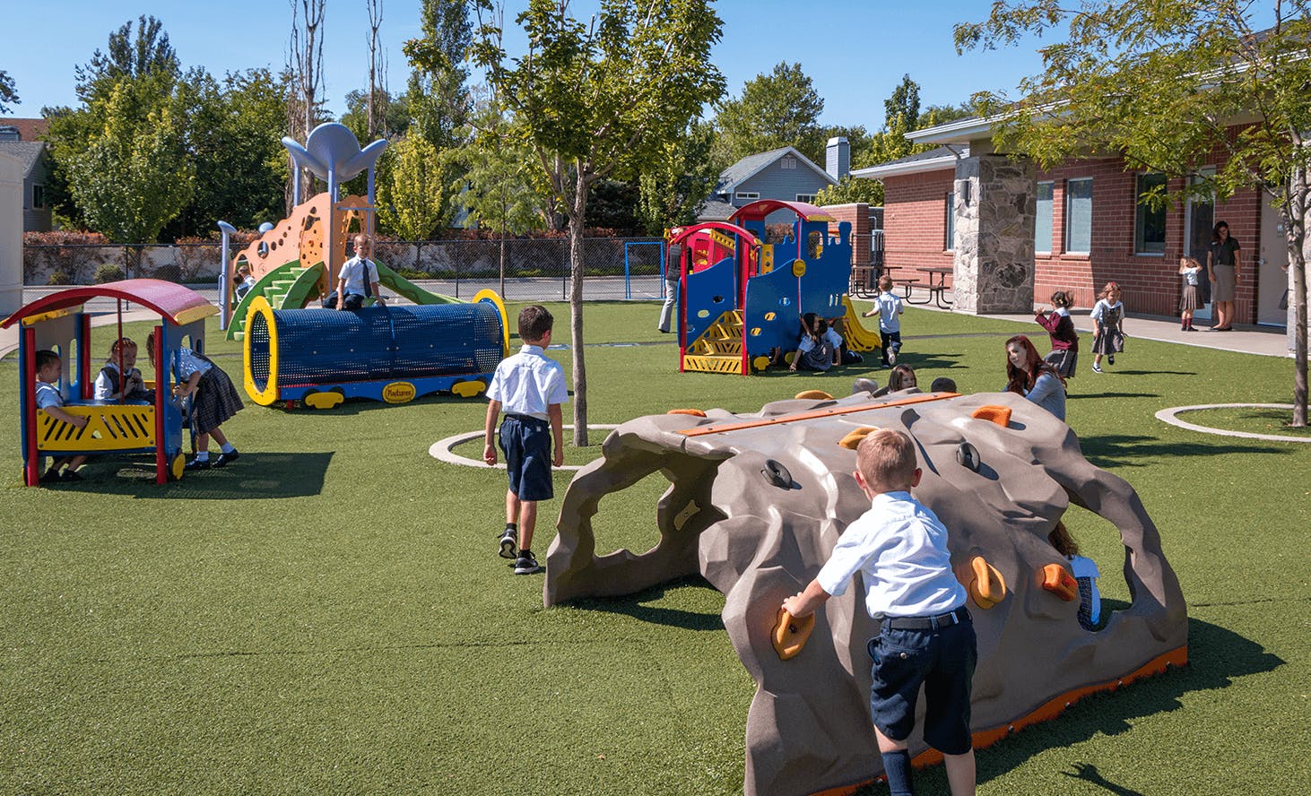 Children playing on playground equipment