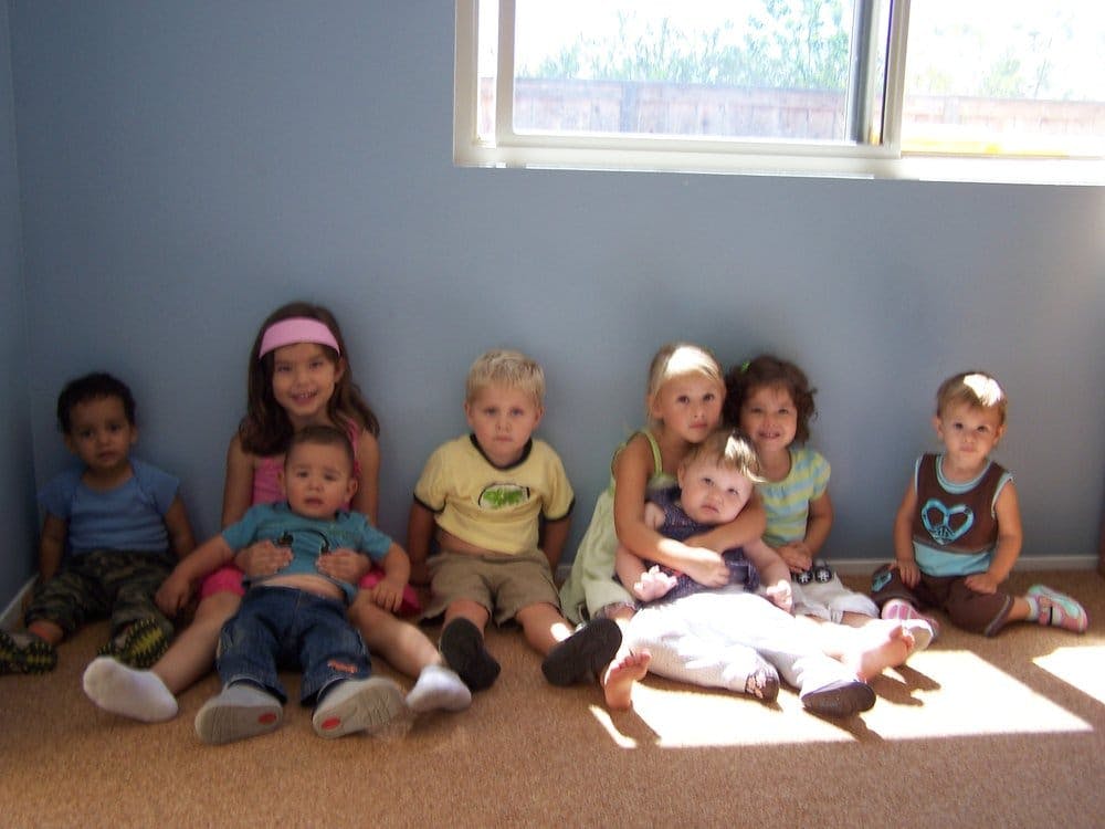 Group of children sitting on the floor