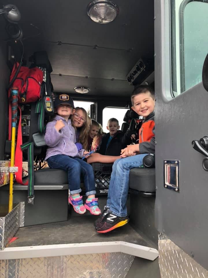 Children sitting inside a vehicle