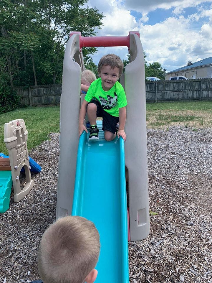 Child on a playground slide