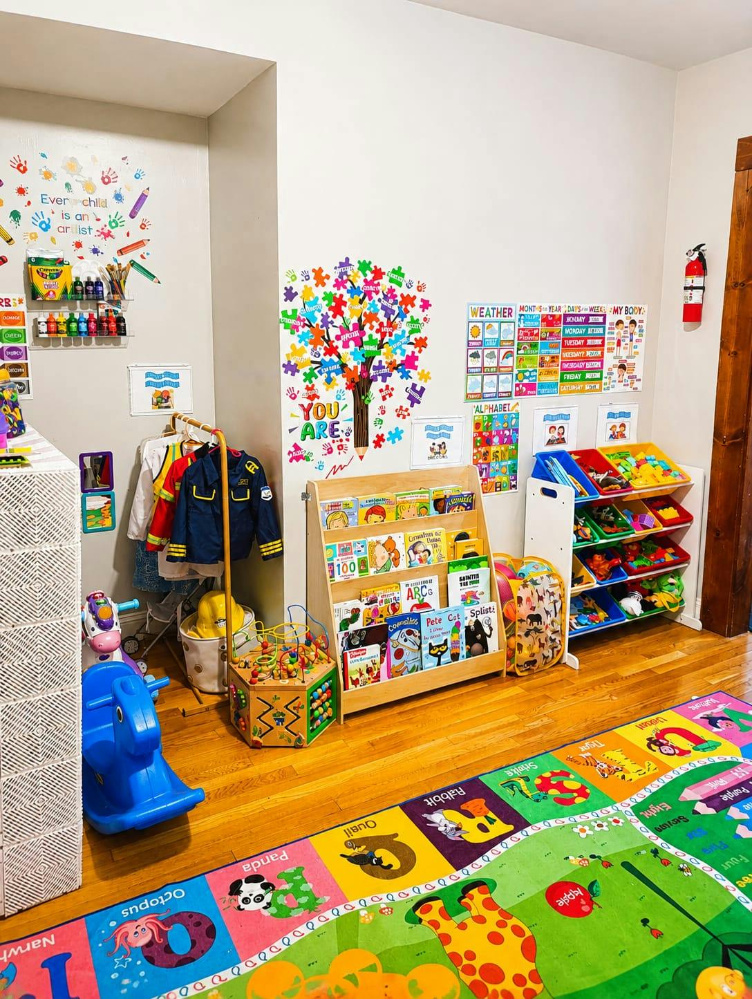 Playroom with children books, educational wall posters, and toy storage units