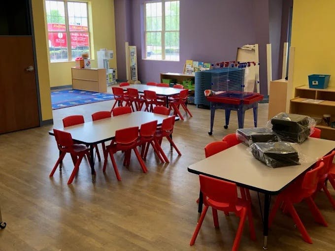 Classroom with small tables and chairs