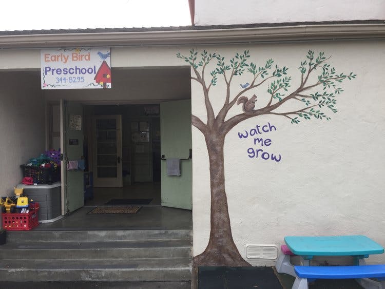 Preschool entrance with a sign that reads "Early Bird Preschool"