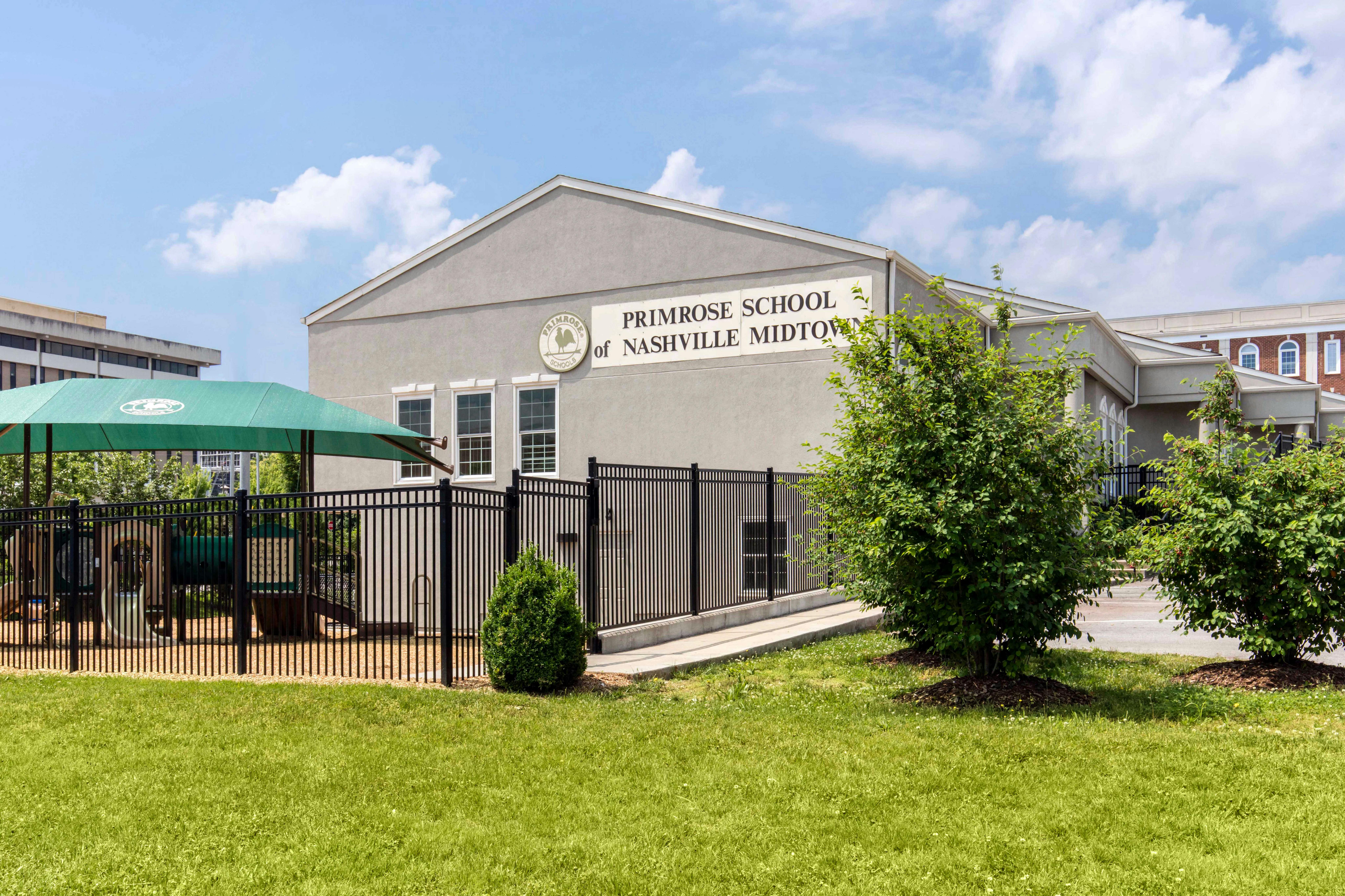 Primrose School of Nashville Midtown building with a playground to the left