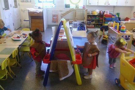 Children playing in a classroom