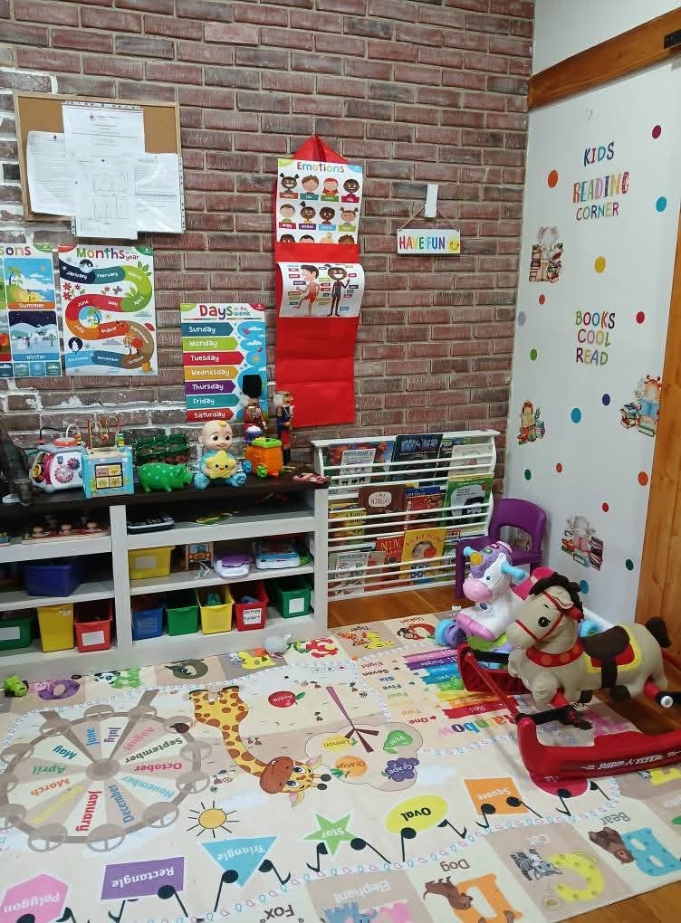 Educational toys and books in a colorful child play area