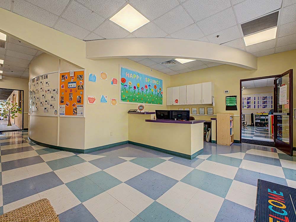 Reception desk in a brightly lit learning center