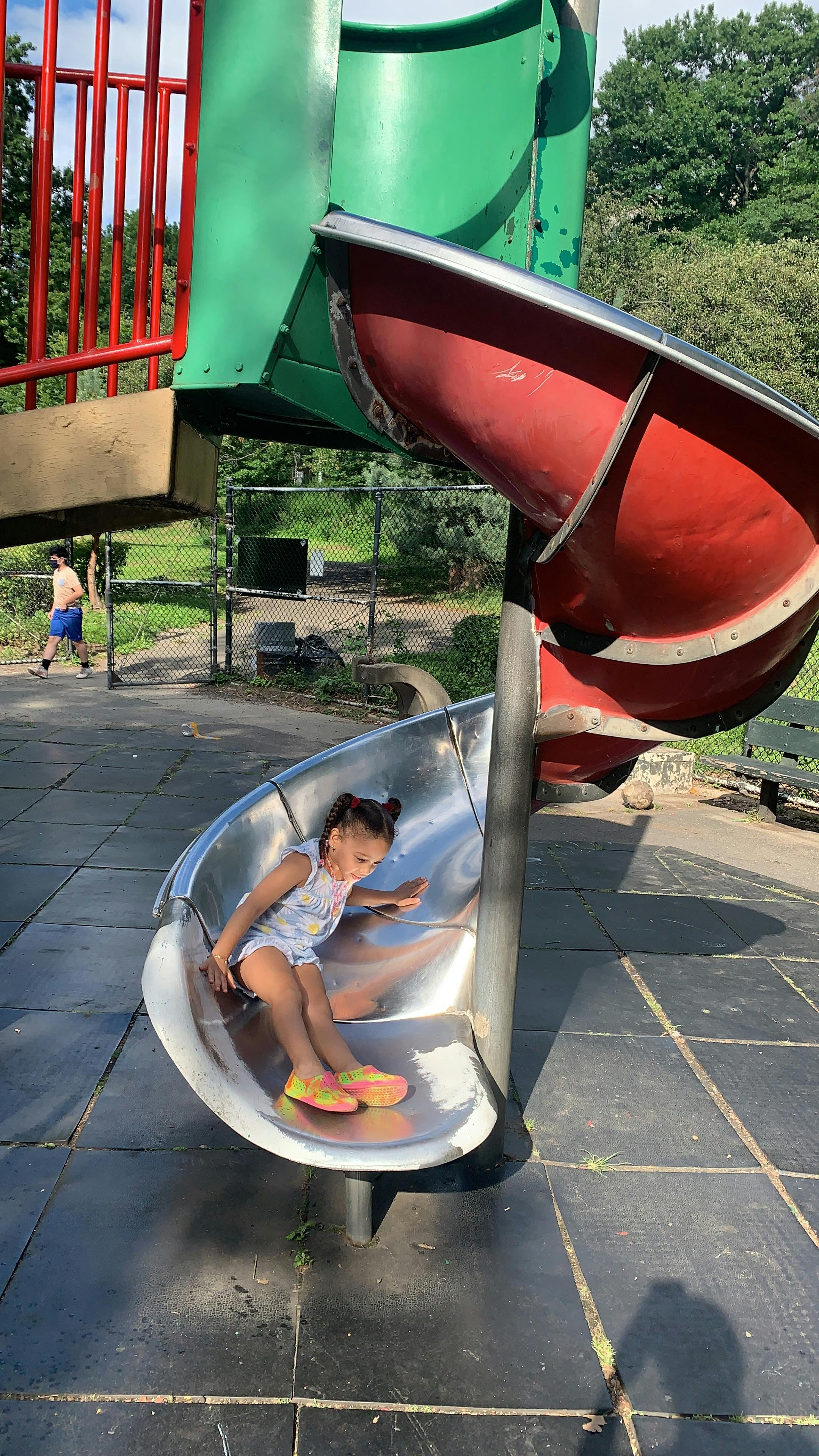 Child on a playground slide