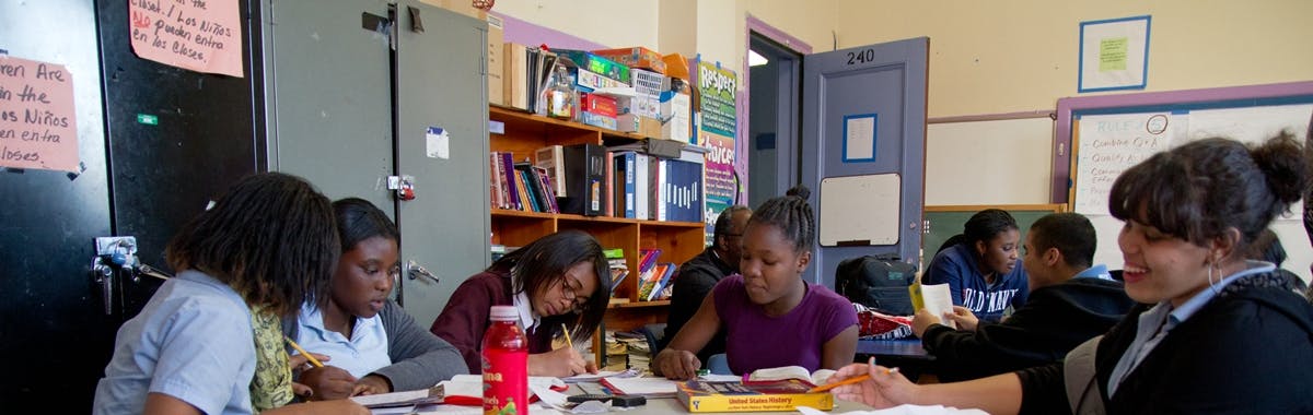People sitting at desks in a classroom