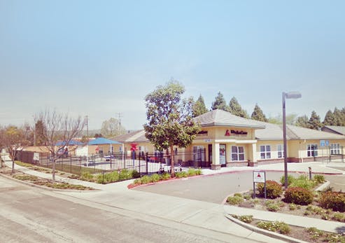 Building with a sign that reads "KidsPark"