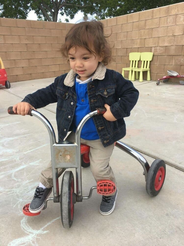 Child on a tricycle