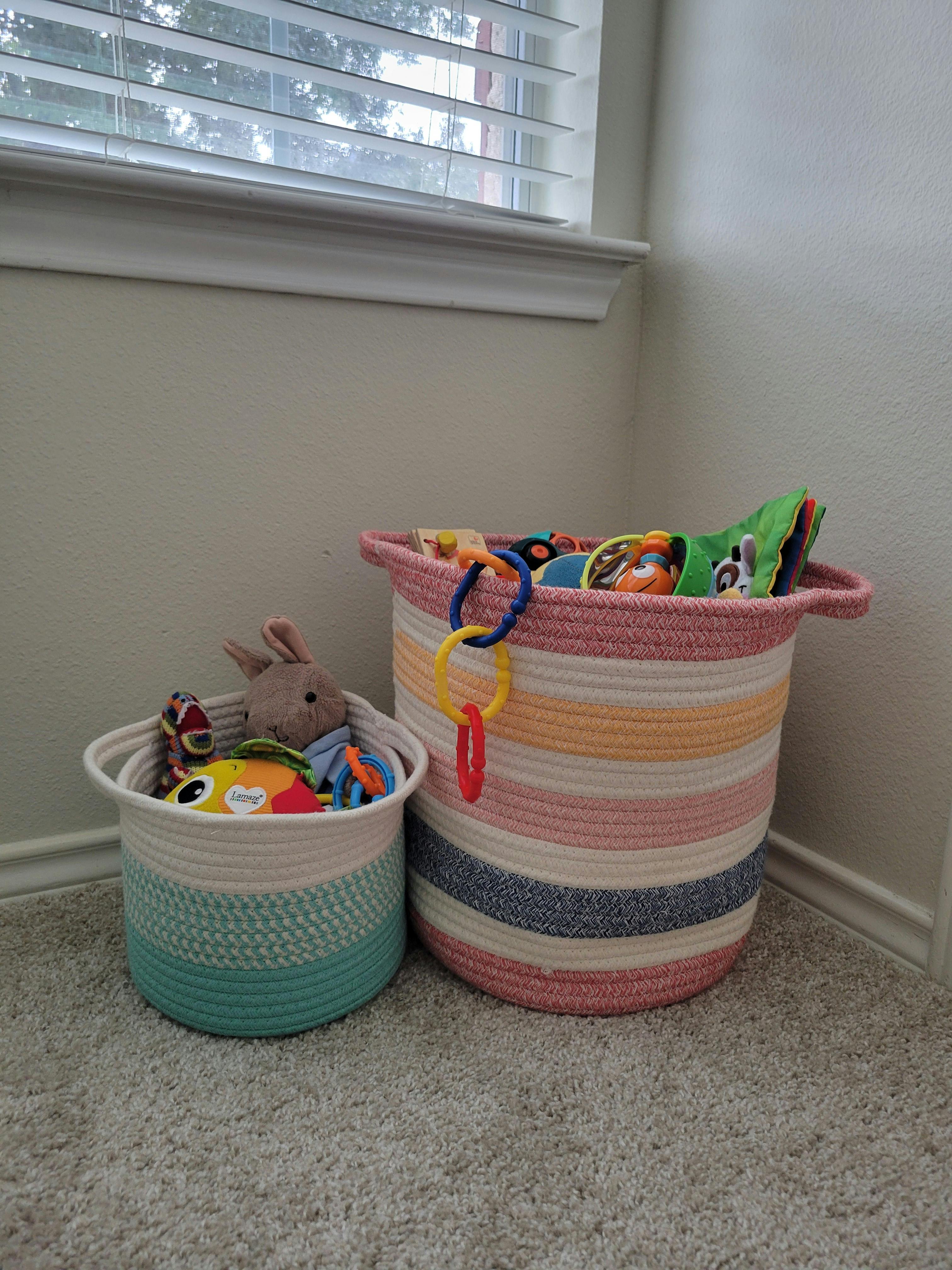 Two woven baskets filled with toys