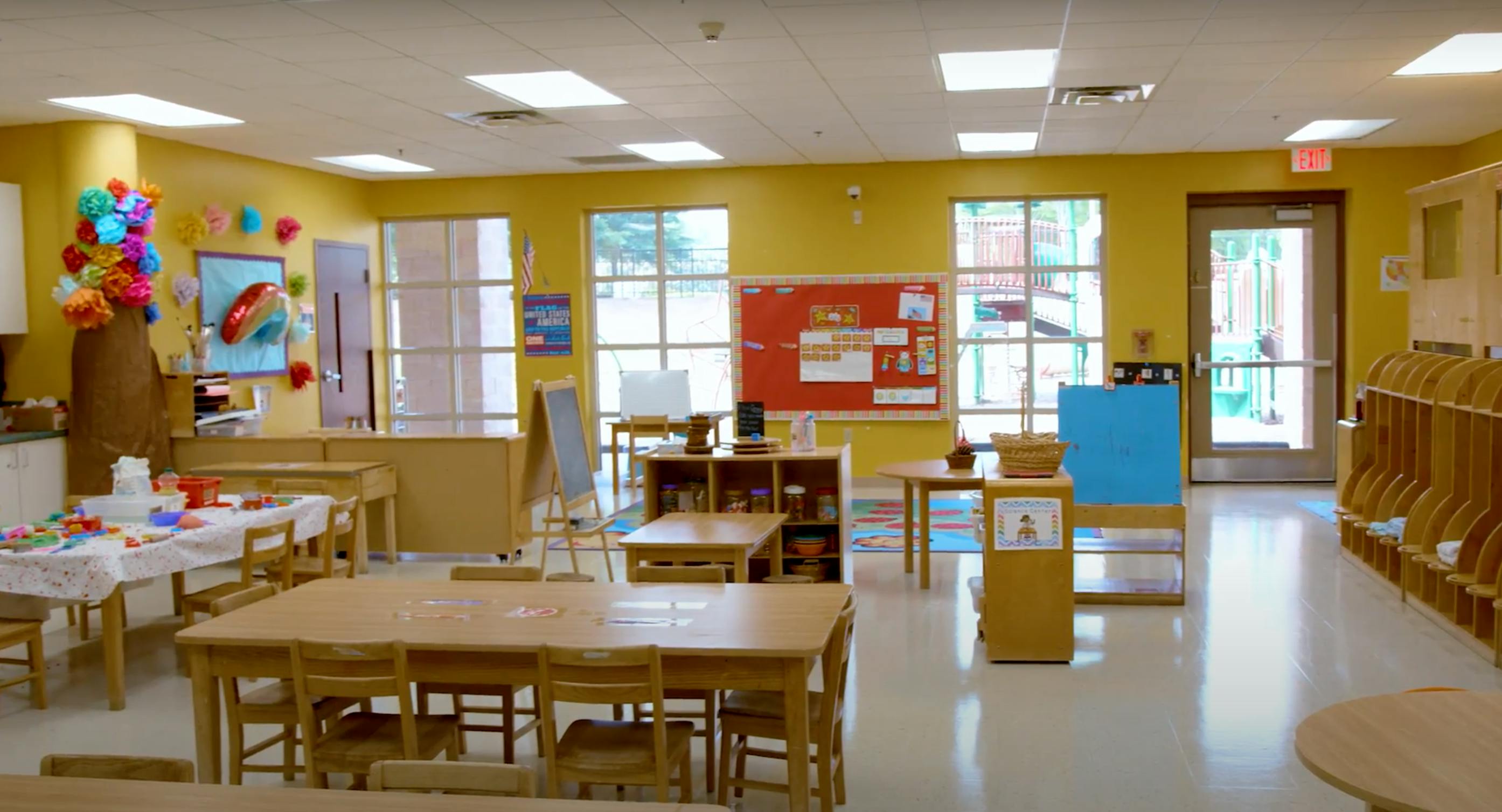 Empty classroom with tables and chairs