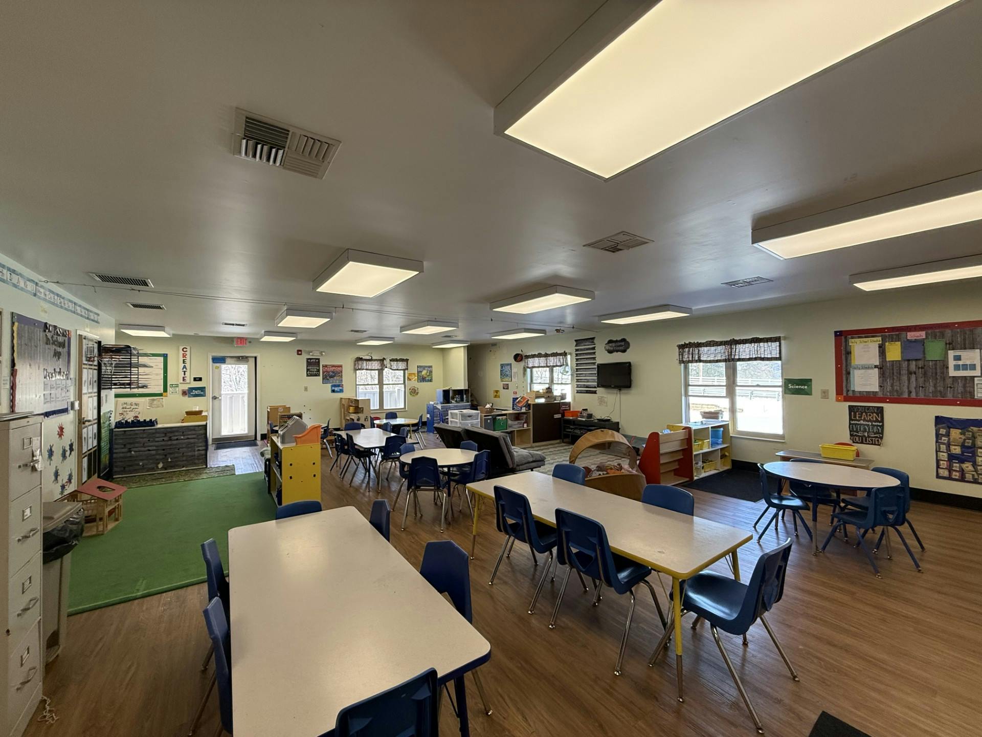 Classroom with child-sized tables and chairs