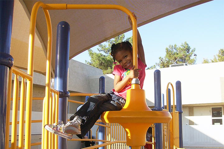 Child on a playground structure