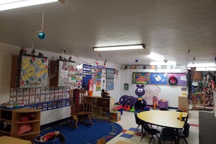 Classroom with colorful decorations and small tables