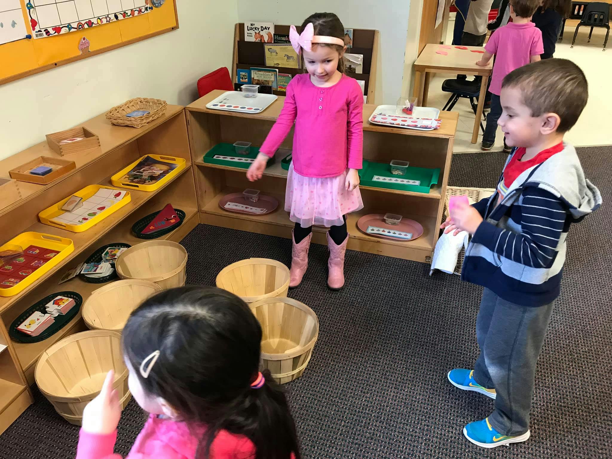 Three children in a classroom