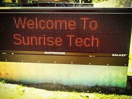 LED sign displaying "Welcome To Sunrise Tech"