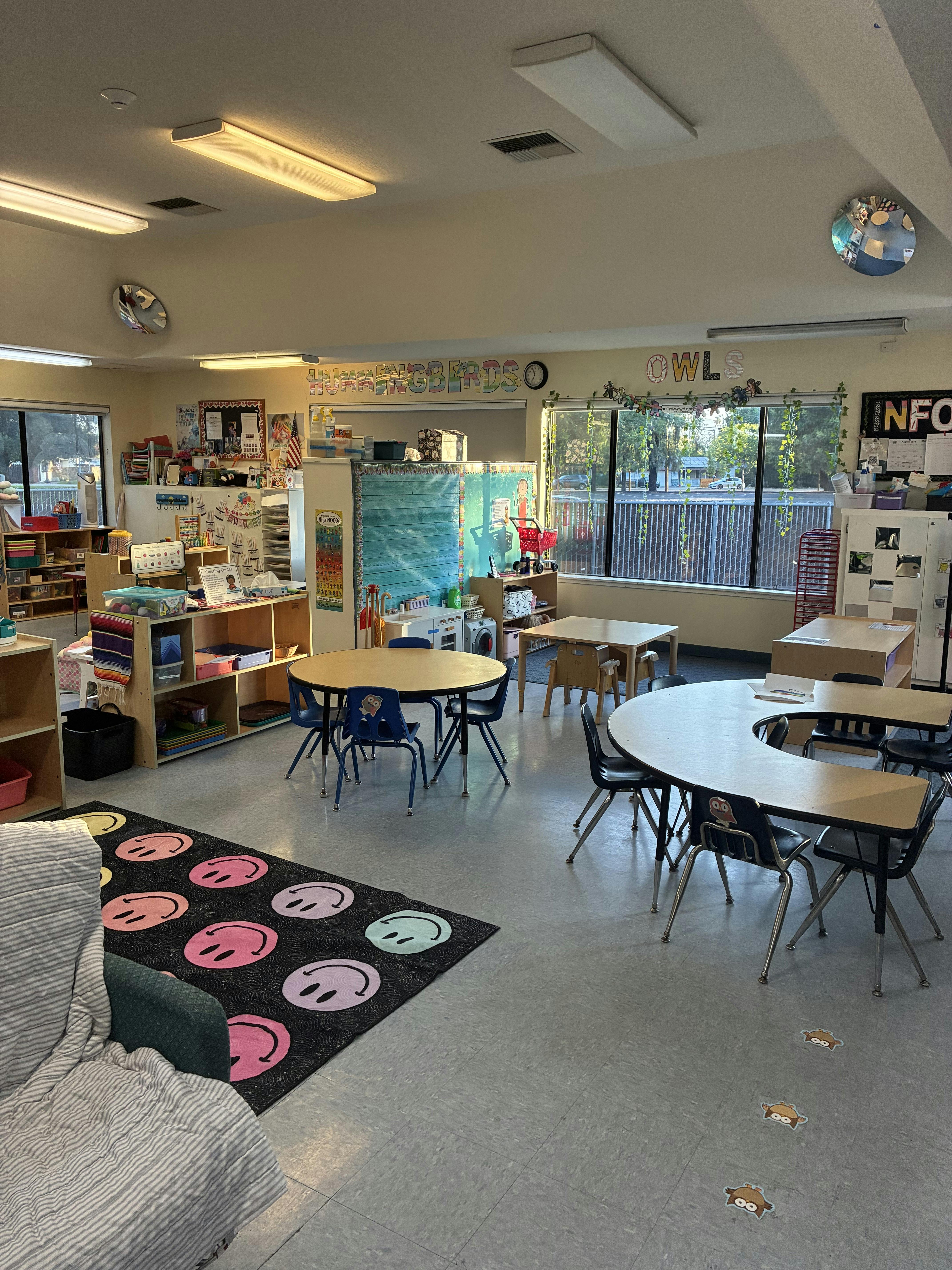 Classroom interior with small tables and chairs for children