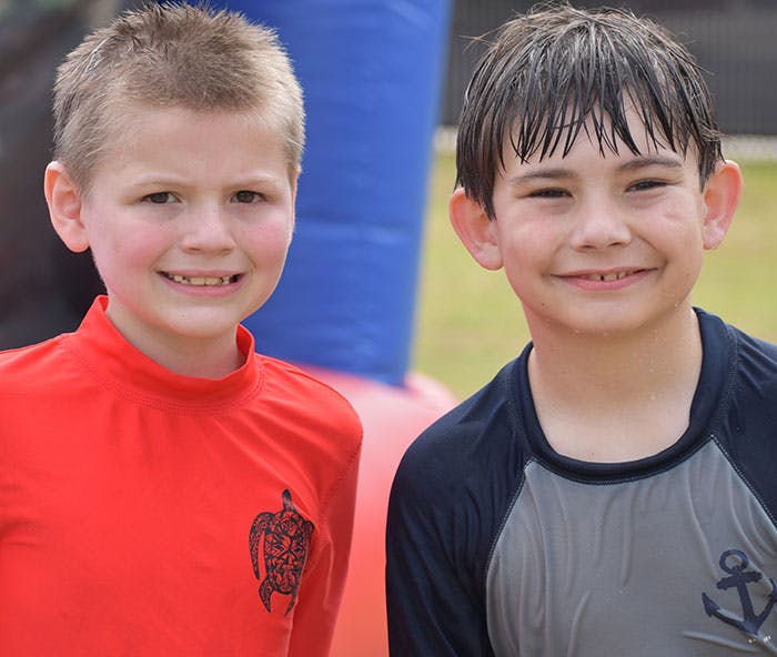 Two children smiling