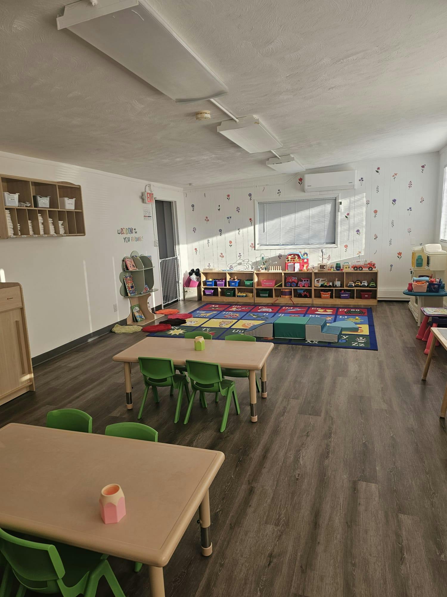 Classroom interior with small tables and chairs for children