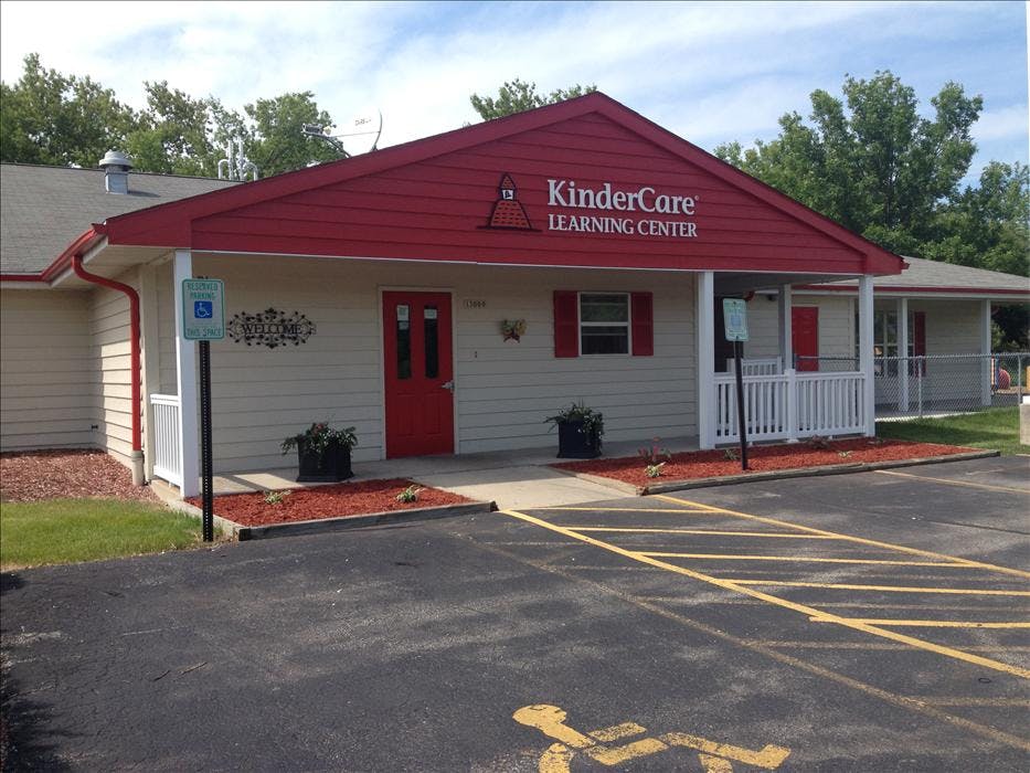 KinderCare Learning Center building with red roof and front door