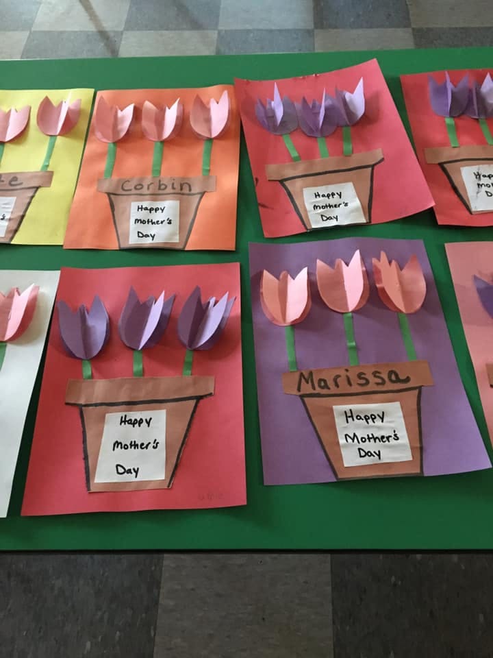 Multiple paper craft tulip flower pots with "Happy Mother's Day" text