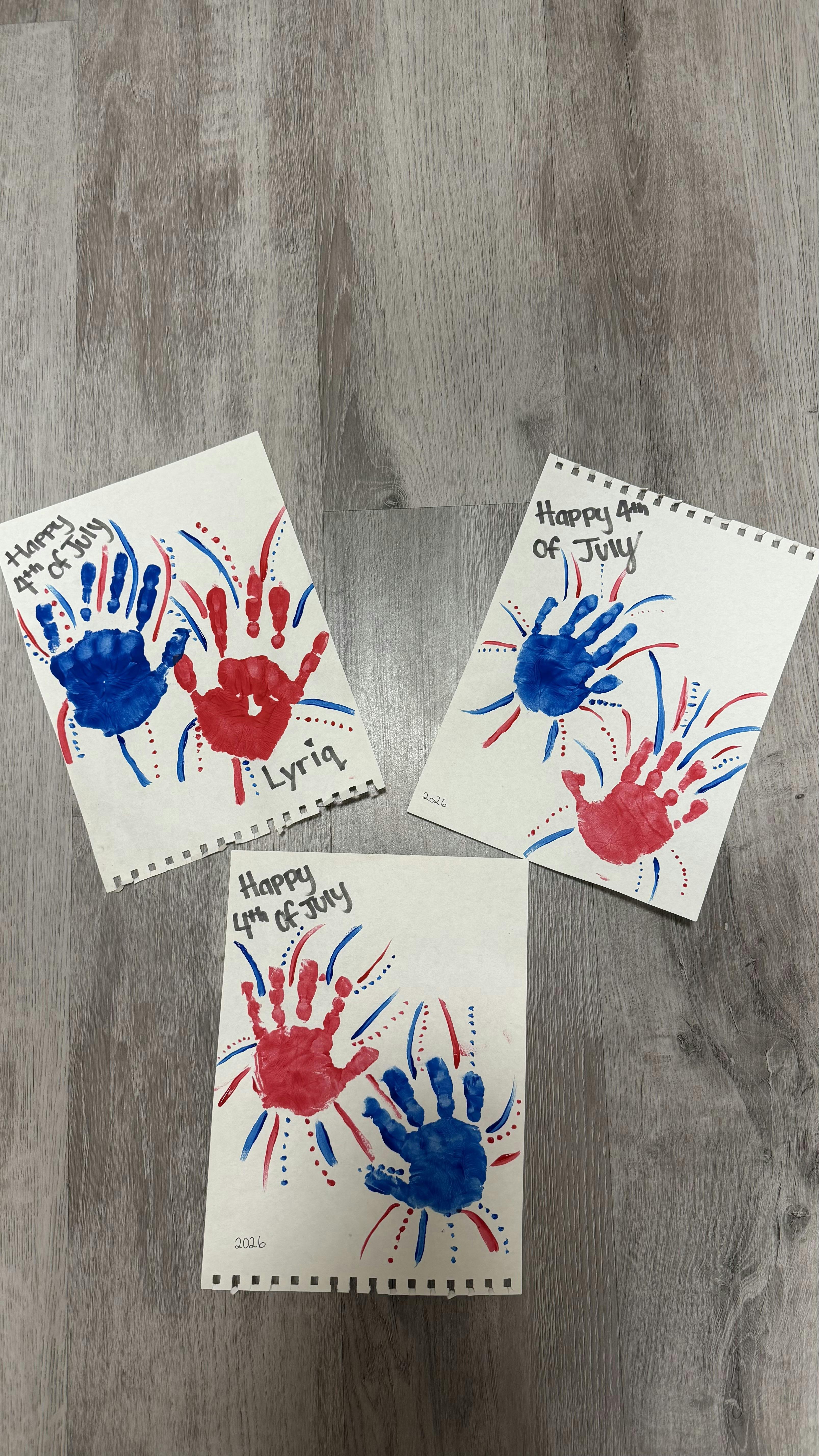 Three sheets of paper with handprint firework art and Happy 4th of July text