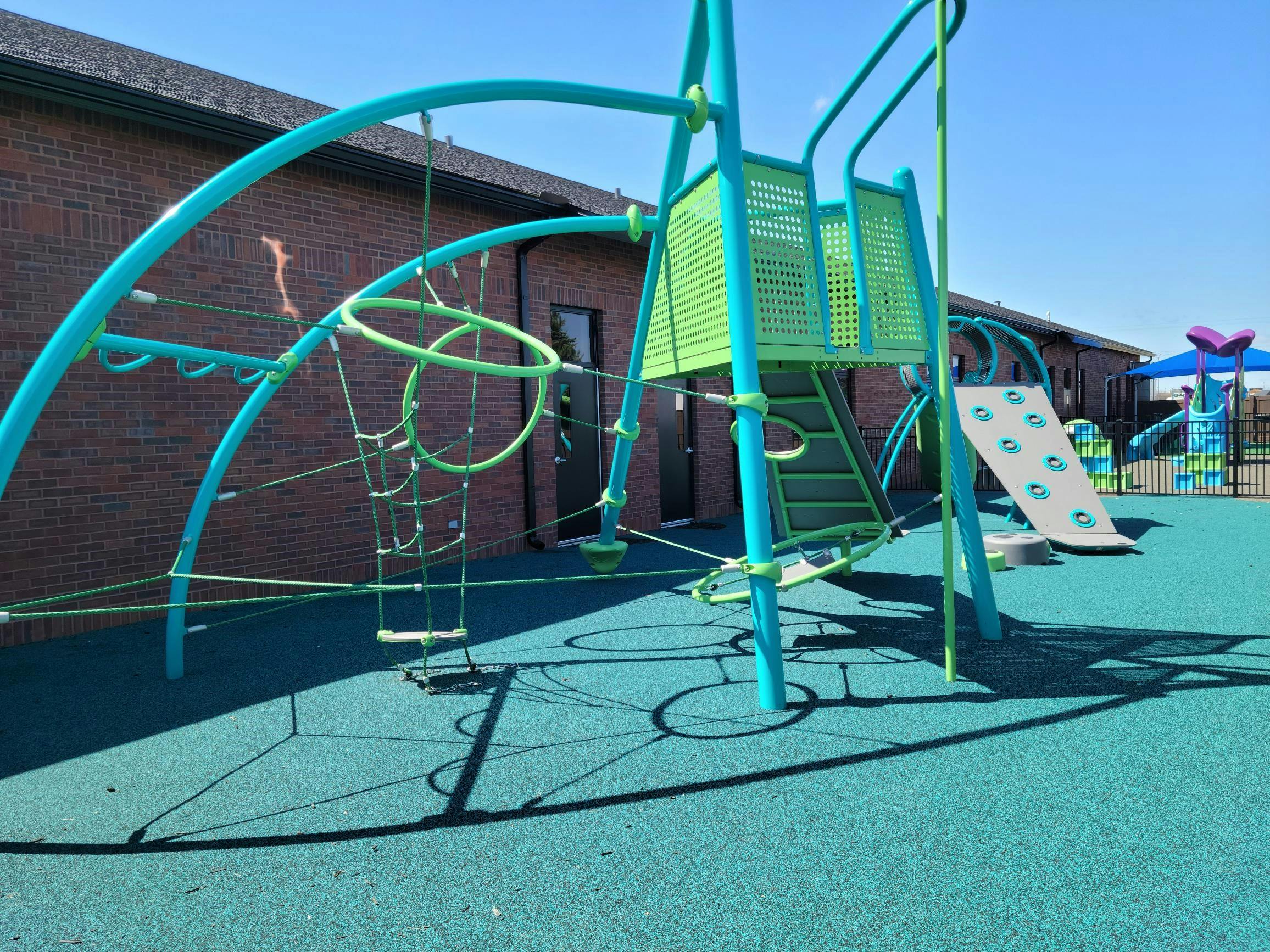 Playground with climbing structures and slide