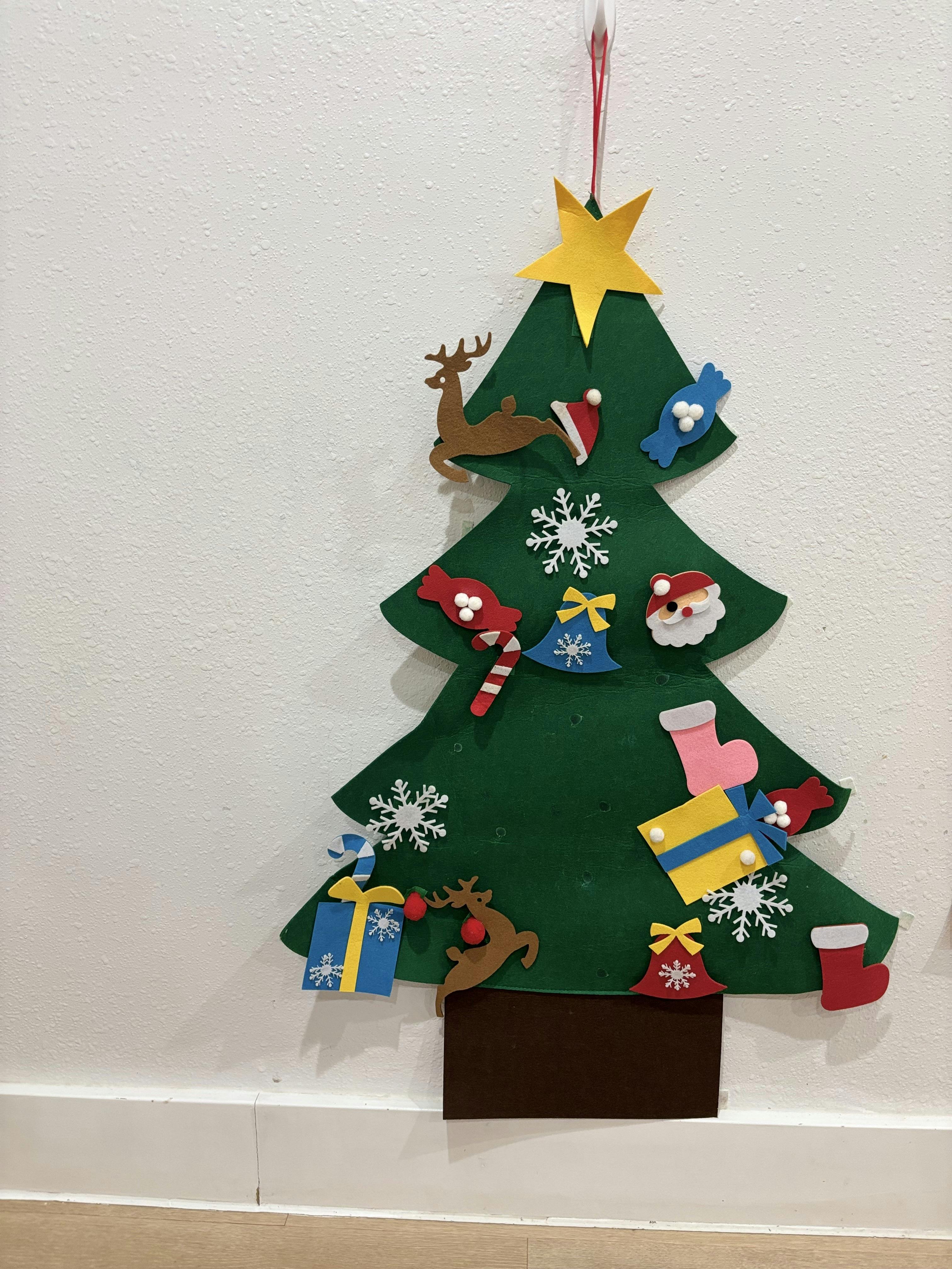 Felt Christmas tree with various holiday ornaments