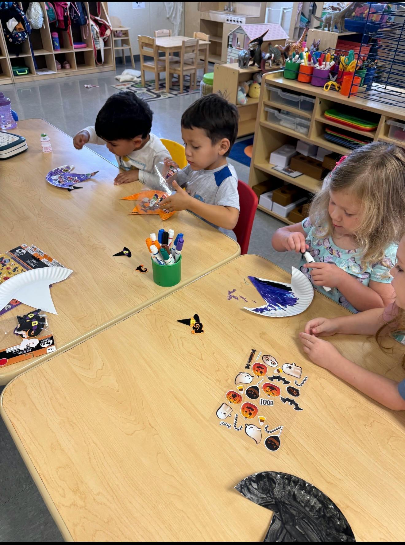 Children doing arts and crafts at a table