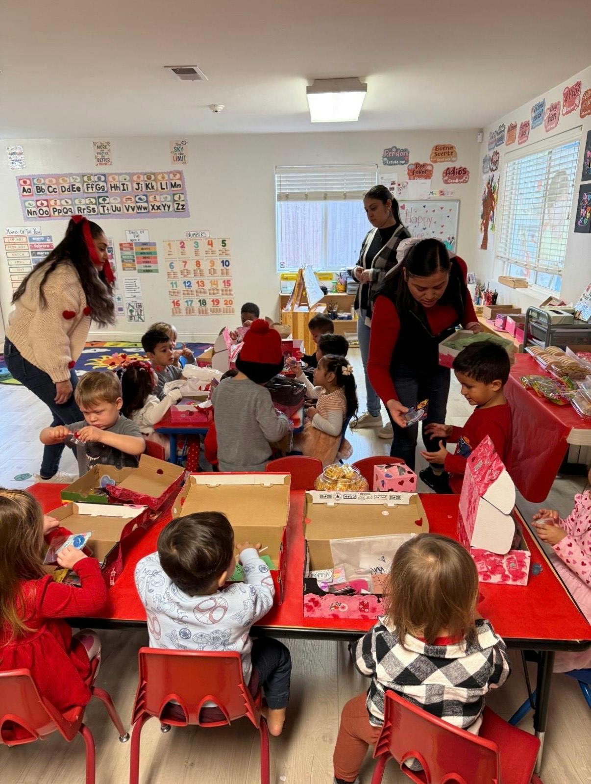 Adults and children in a classroom