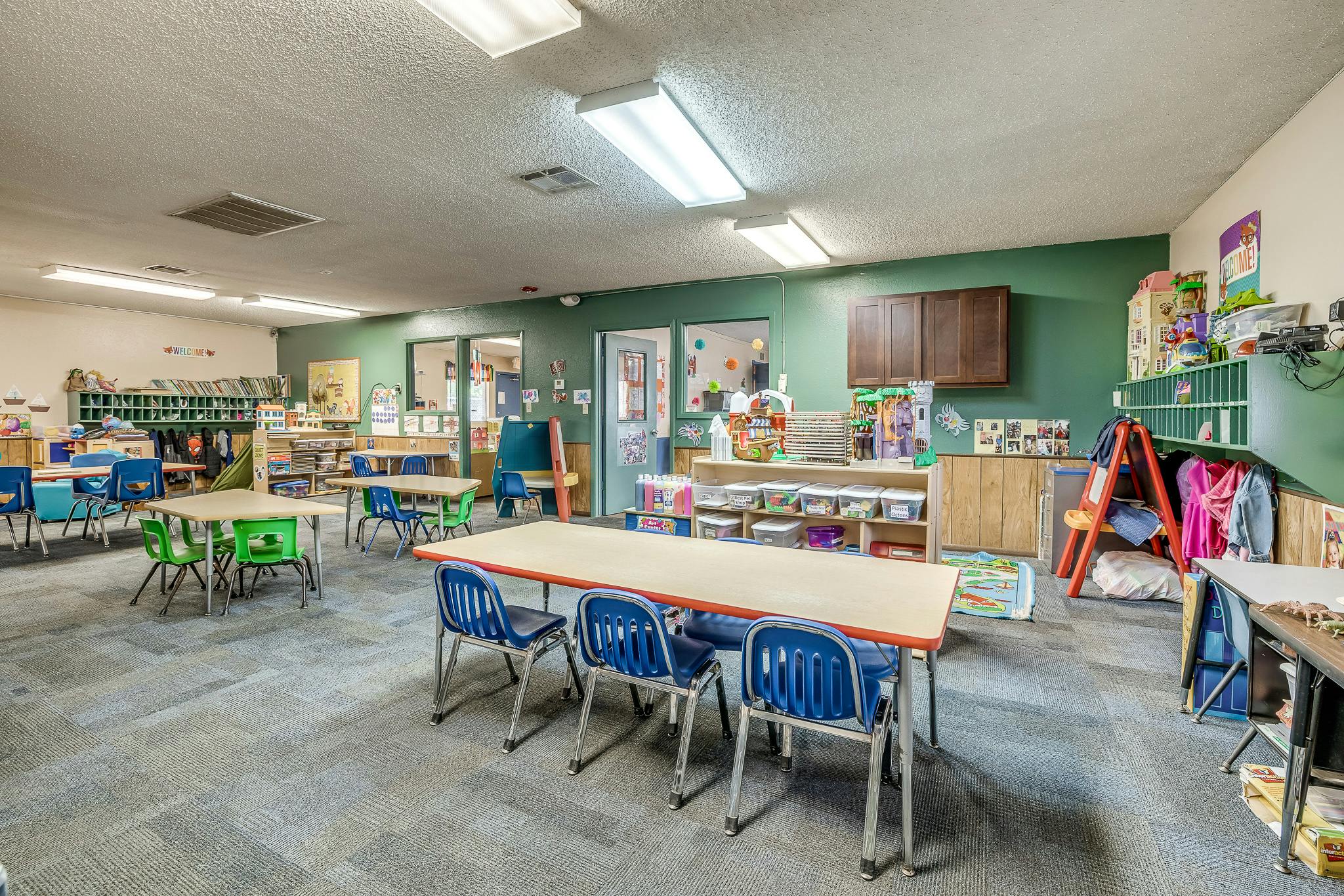 Classroom with multiple tables and chairs