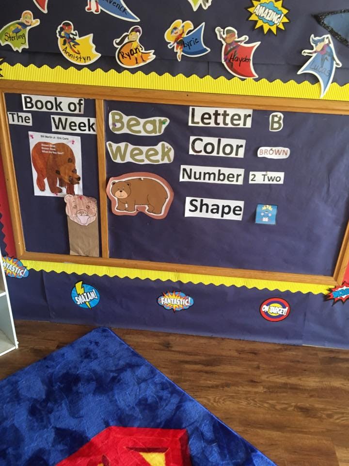 Classroom bulletin board with "Book of the Week" and "Bear Week" displays