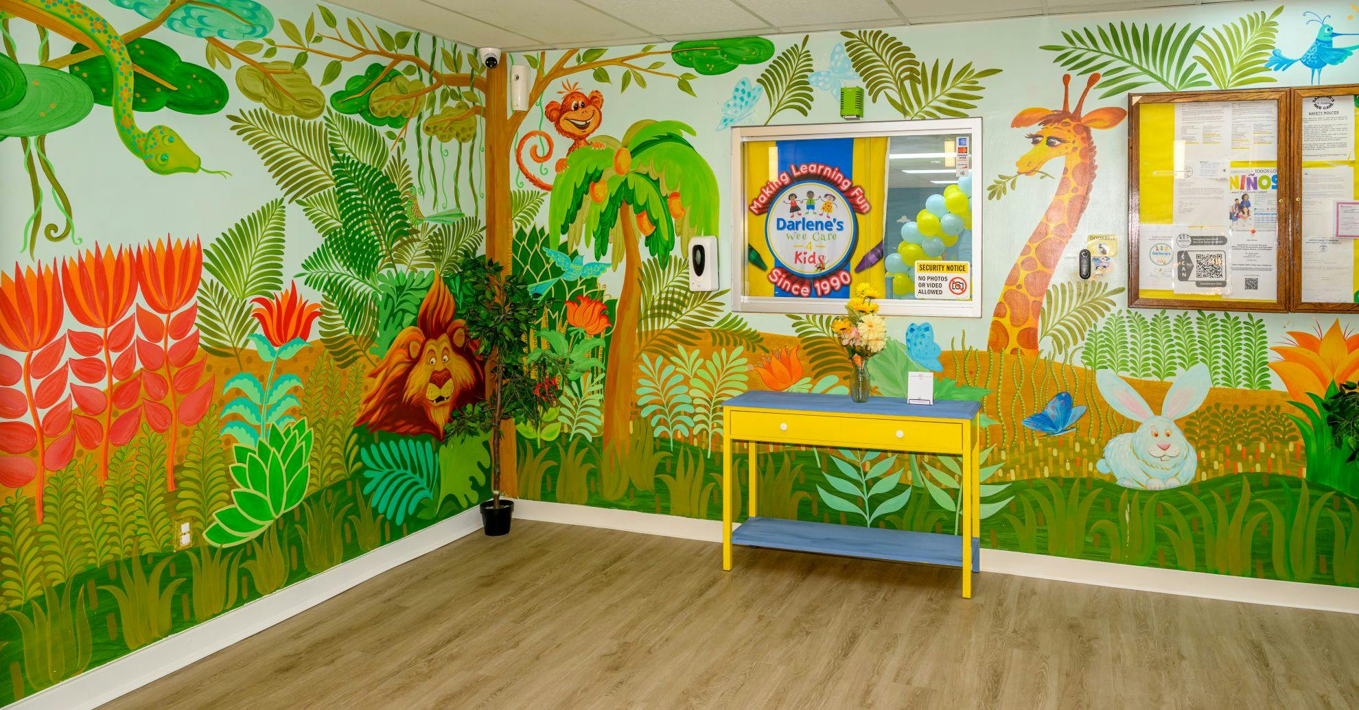 Jungle themed wall mural in a childcare center entrance