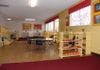 Empty classroom with tables and chairs