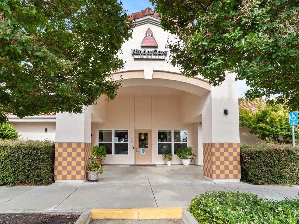 KinderCare Learning Center building entrance with a sign above