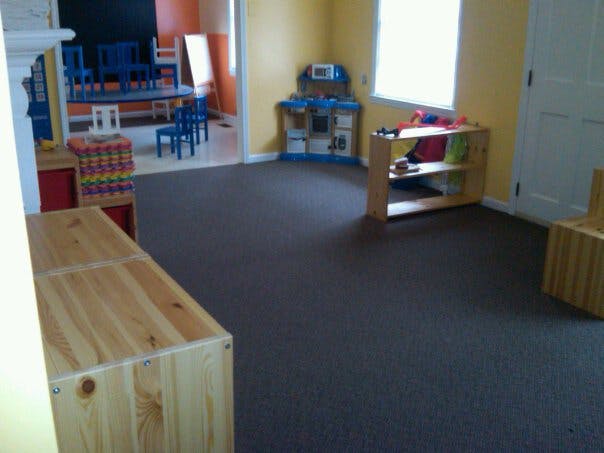 Playroom with toys and furniture