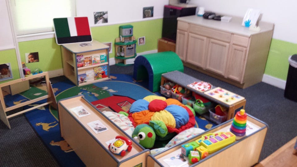 Playroom with colorful toys and furniture