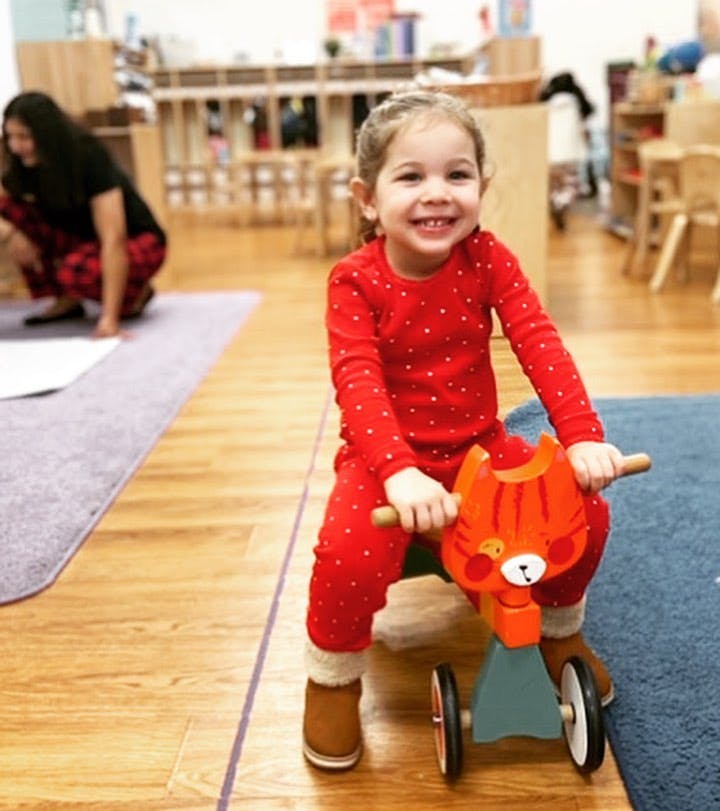 Child on a toy ride-on animal