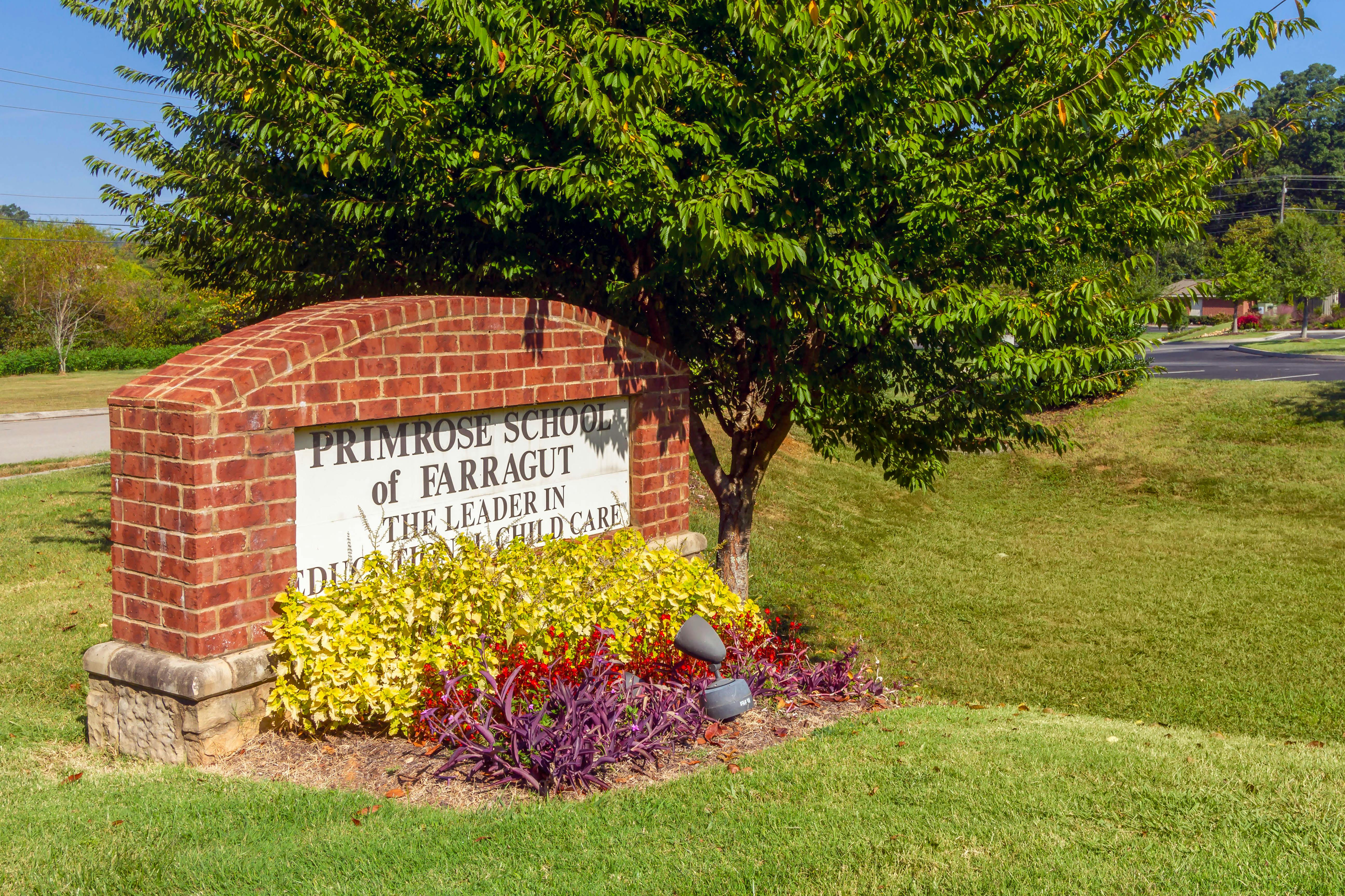 Brick school sign for Primrose School of Farragut
