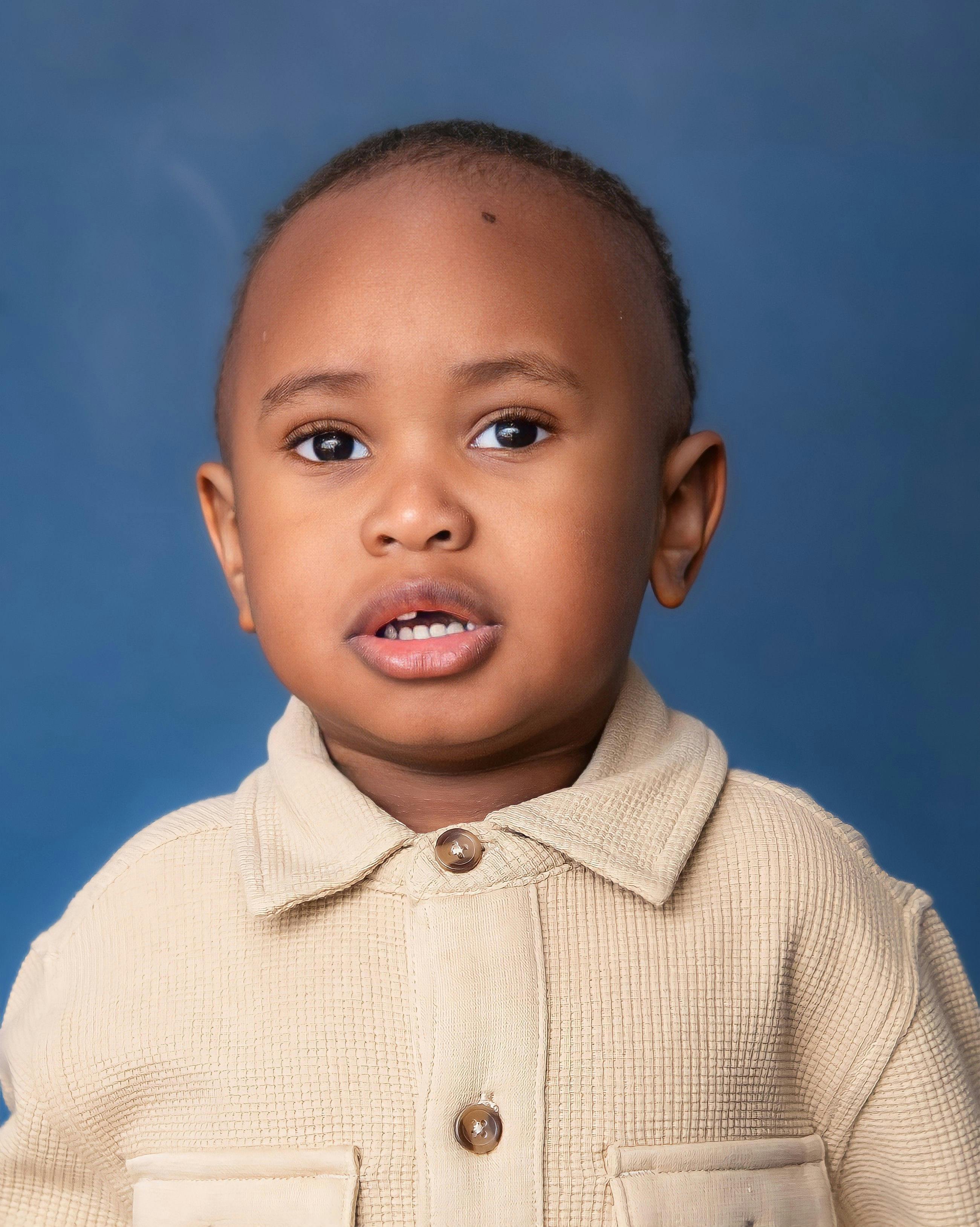 Child wearing a collared shirt