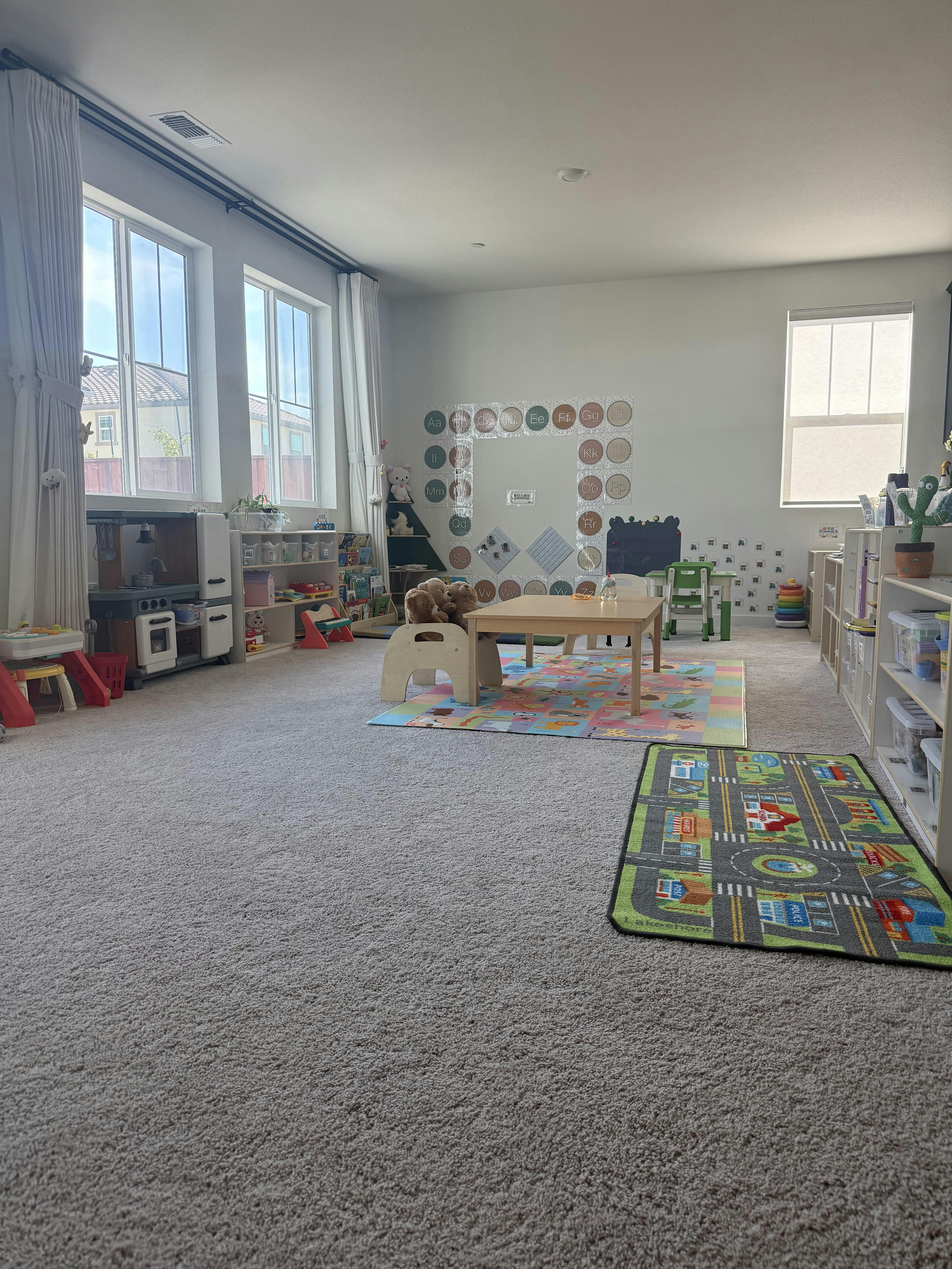 Spacious playroom with toy sets and learning materials
