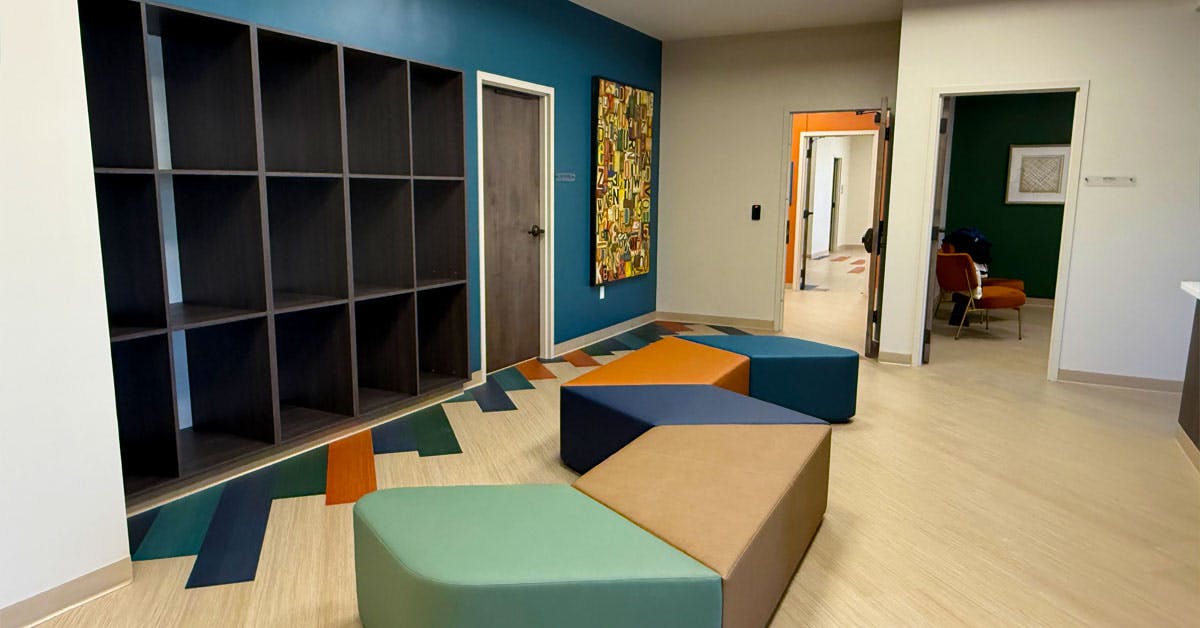 Room with built-in shelving and modular seating