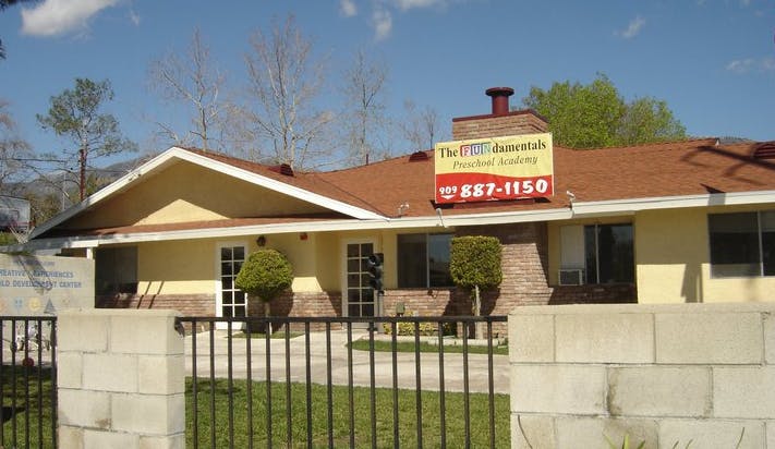 Building with a sign that reads "The Hill Associates 887-1150"