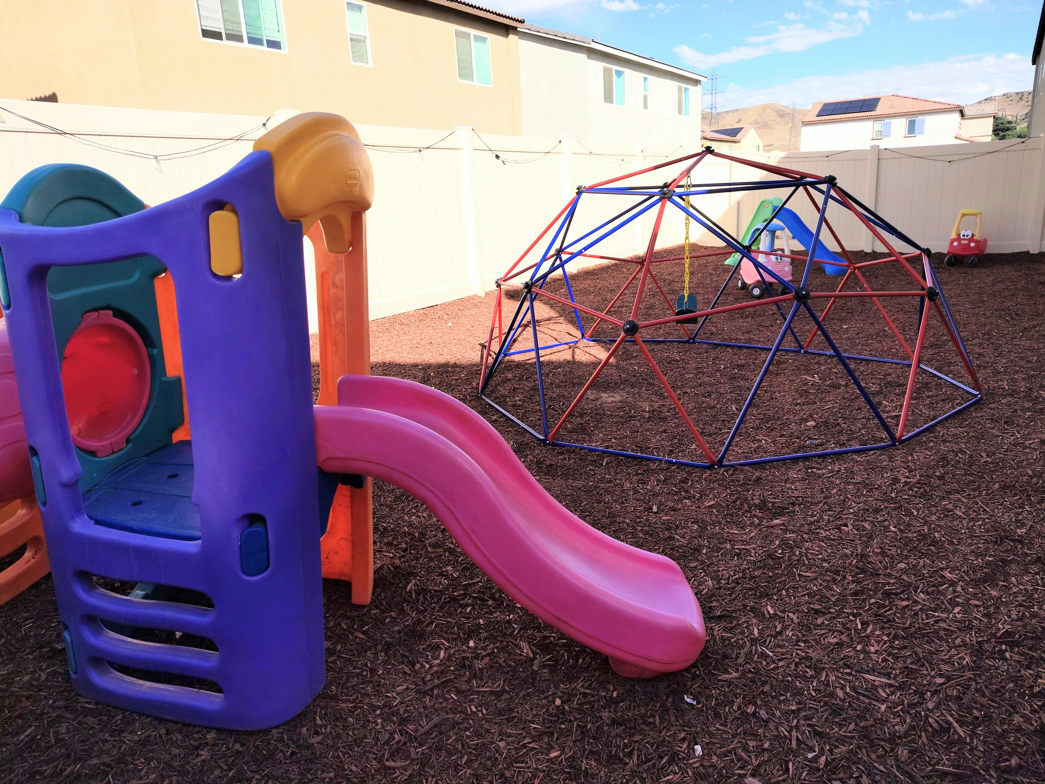 Playground with slide and climbing dome