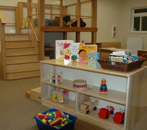 Books and toys on shelves in a classroom