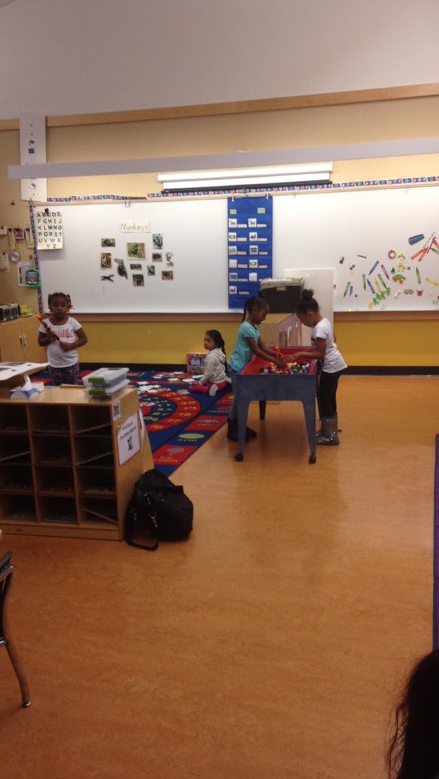 Children playing in a classroom